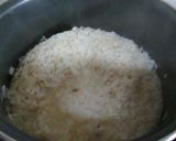Foto del paso 10 de la receta: Arroz con salchichas en salsa y huevos fritos