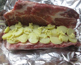 Foto del paso 5 de la receta: Cabezada de lomo de cerdo rellena con patatas y queso