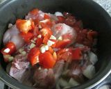 Foto del paso 2 de la receta: Arroz con pollo y aceitunas negras 