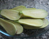 Foto del paso 1 de la receta: Calabacines rellenos de acelga, champiñones con cebolla dorada y salsa blanca