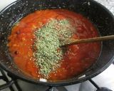 A picture of step 7 of Oregano Pizza with Sardines and Roasted Peppers.