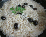Foto del paso 11 de la receta: Merluza a la romana y arroz seco con olivas mallorquinas