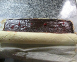 Foto del paso 11 de la receta: Tronco de árbol con crema de chocolate y cerezas