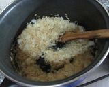 Foto del paso 8 de la receta: Arroz con salchichas en salsa y huevos fritos
