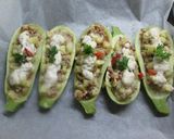 Foto del paso 9 de la receta: Calabacines rellenos de carne con salsa blanca 