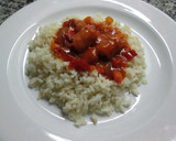 Foto del paso 12 de la receta: Arroz con salchichas en salsa y huevos fritos