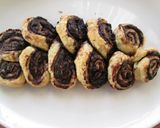 Foto del paso 8 de la receta: Pan de rollitos hojaldrados con chocolate