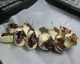 Foto del paso 6 de la receta: Pan de rollitos hojaldrados con chocolate