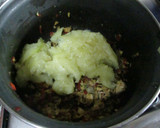 Foto del paso 4 de la receta: Calabacines rellenos con pollo asado del día anterior