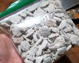 A picture of step 3 of "Puppy Chow" Snack Mix.