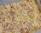 Foto del paso 7 de la receta: Hojaldrado de salchichas y cebollitas