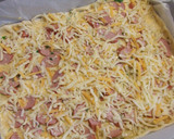 Foto del paso 7 de la receta: Hojaldrado de salchichas y cebollitas