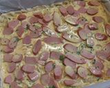 Foto del paso 6 de la receta: Hojaldrado de salchichas y cebollitas