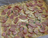 Foto del paso 6 de la receta: Hojaldrado de salchichas y cebollitas