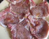 Foto del paso 1 de la receta: Chuletas de cerdo al orégano con guisantes