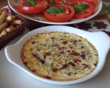 Foto del paso 4 de la receta: Rodajas de provolone dolce con tomates secados en aceite