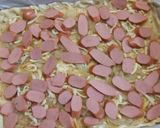 Foto del paso 5 de la receta: Hojaldrado de salchichas y cebollitas