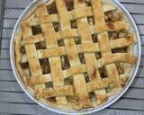 A picture of step 11 of Apple pie with flaky butter crust served with vanilla ice cream.