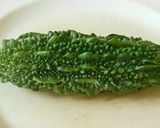 A picture of step 1 of Spicy aromatic nutritious stuffed bitter gourd in tomato sauce.