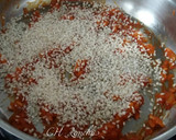 Foto del paso 2 de la receta: Arroz con guisantes y jamón