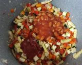 A picture of step 5 of Burnt chilli garlic rice with baked beans gravy.