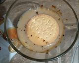 A picture of step 3 of Marie biscuits delight.