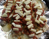 Foto del paso 7 de la receta: Filet de merluza a la pizza
