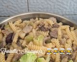 A picture of step 4 of Fusilli with Broccoli, Sausage, and Black Olives.