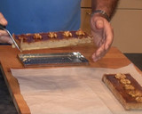 Foto del paso 11 de la receta: Pastelitos de hojaldre con nueces y coco
