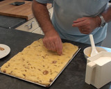 Foto del paso 12 de la receta: Coca de brioche con nueces y pasas