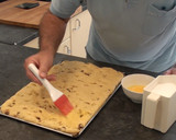 Foto del paso 11 de la receta: Coca de brioche con nueces y pasas