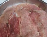 A picture of step 2 of Meat with potatoes in the oven.