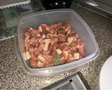 A picture of step 1 of Braised Pork Chops, White Rice, Lettuce and Tomato Salad.