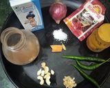 A picture of step 1 of Chingri macher malai curry (Prawn malai curry Bengali special).