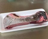 A picture of step 1 of Roasted Collar of Maguro.