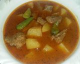 A picture of step 4 of Allu gosht.