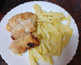 Foto del paso 8 de la receta: Rollitos de pechuga rellenos de jamón serrano, queso y espinacas con papas fritas