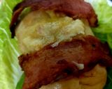 A picture of step 4 of My Chicken breast with Brie and Streaky bacon wrapped around. 😋.