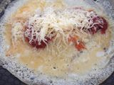 Tortilla de tomate frito con queso 