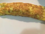 Tortilla francesa con bacon y queso en polvo