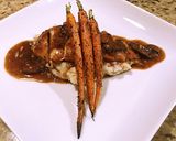 A picture of step 7 of Chicken Marsala.