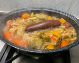 Une image de l'étape 20 de Potée au chou, saucisse de morteau, lard, carottes et navets.