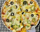 A picture of step 11 of Hawaiian Chicken Pizza.