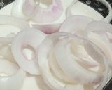 A picture of step 1 of Crispy onion rings.