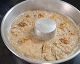 Foto del paso 3 de la receta: Budín integral de naranja, nueces y garrapiñada