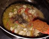 A picture of step 12 of Tikka chicken macroni.