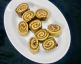A picture of step 13 of Mary Biscuit Swiss Roll / No Bake Chocolate Roll.