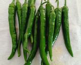 A picture of step 1 of Green Chillies Pickle - Instant and Delicious.