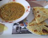 A picture of step 3 of Ndengu in coconut sauce served with chapati.