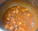 A picture of step 8 of One-pot Vatha kuzhambu rice.